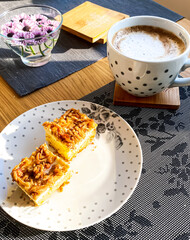 breakfast with cappucino coffee and gluten-free apple pie with curd