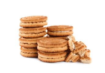 Tasty sandwich cookies with cream on white background