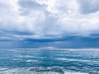 Dark sky sea horizon, natural seascape background, vivid colors