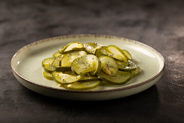 Sunomono. Plate with Japanese cucumber salad.