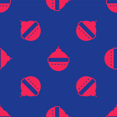 Red Christmas ball icon isolated seamless pattern on blue background. Merry Christmas and Happy New Year. Vector