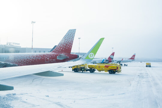 Saint-Petersburg, Russia - February 13, 2021: Airplane of Airline S7 in the airport Pulkovo in winter.