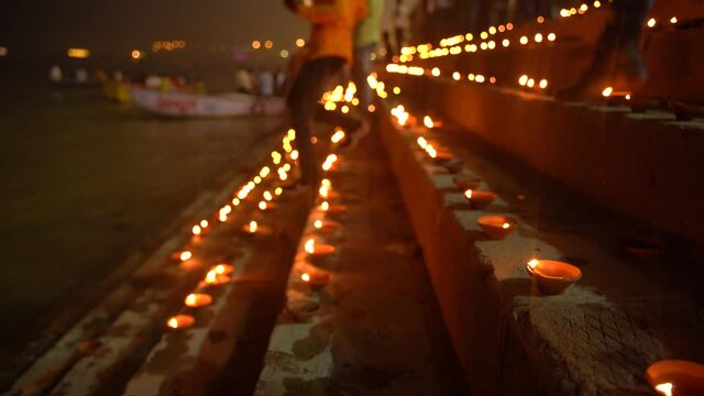 Closeup of lit Diya at the ghats of Varanasi during Dev Diwali