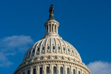 Fototapeta na wymiar United States Capitol Building - Washington, DC - This is where all of the congressmen and congresswomen work (House of Representatives and Senate)