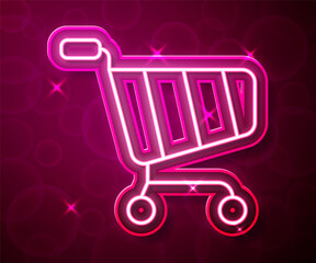 Glowing neon line Shopping cart icon isolated on red background. Online buying concept. Delivery service sign. Supermarket basket symbol. Vector