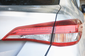 Close-up view of red car tail lights