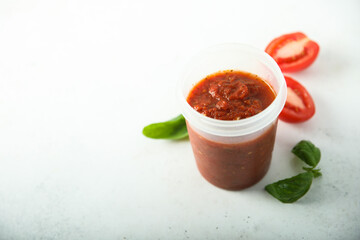 Traditional homemade tomato sauce with basil