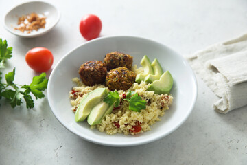 Falafel with couscous and avocado