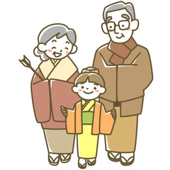 着物を着て初詣に行くシニア夫婦と孫