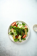 Artichoke salad with tomatoes and cucumber