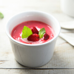 Refreshing cold raspberry soup with fresh mint