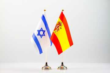 State flags of Israel and Spain on a light background. Flags of states.