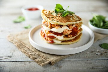 Savory pancakes with chicken and cheese