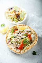 Fresh Greek pita bread with chicken and vegetables