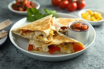Homemade quesadilla with chicken and tomatoes