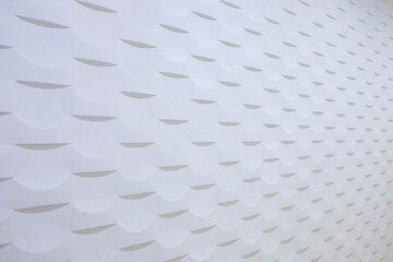 Geometric decorative patterns on the white walls of the interior