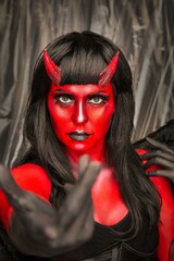 Devilish Woman or Lady Demon Creative Photosession