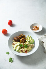 Falafel with couscous and avocado