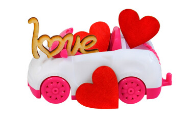 valentines day background with copy space for text, festive car toy with love and wooden decorations shape heart, red greeting card isolated on white background