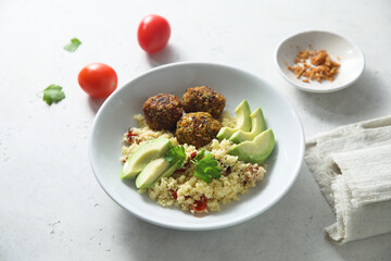 Falafel with couscous and avocado