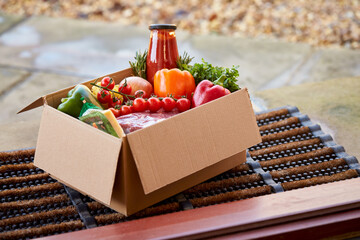 Box Of Fresh Ingredients For Online Meal Food Recipe Kit Delivered To Home On Doorstep