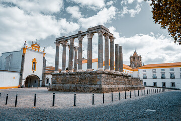 Naklejka premium the city of Evora in Portugal. wide panorama from the remains of the former temple with large columns