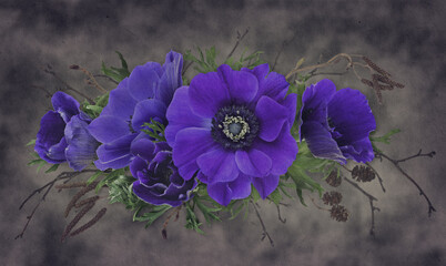 Blue anemone flowers and dry twigs in a floral arrangement on dark background