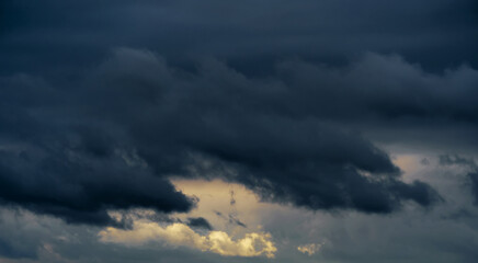 beautiful dark dramatic sky with stormy clouds before the rain or snow