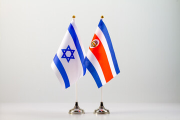 State flags of Israel and Costa Rica on a light background. Flags of states.