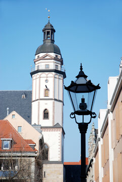 Leipzig, Germany lantern and architecture with Saint Thomas church