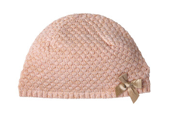 Closeup of a beautiful knitted pink wool hat or cap with a gold ribbon bow isolated on a white...