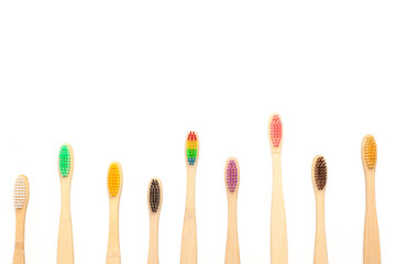 Set made of bamboo toothbrushes isolated on white background. Plastic free.