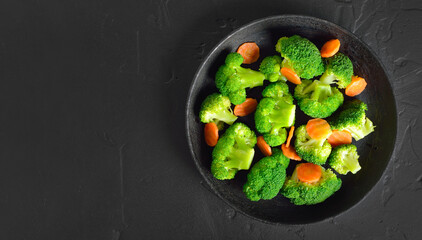 Broccoli and carrots in frying pan