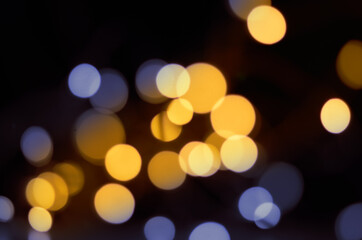 Obraz premium defocused lights on black background