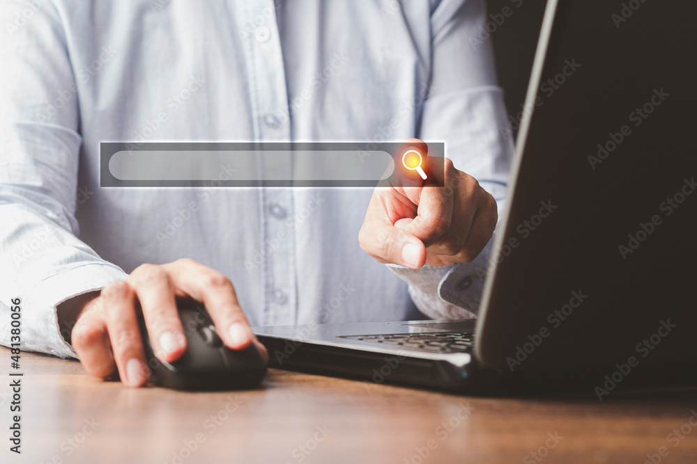 Poster search engine online concept. close-up of hand a man using a laptop for searching information on a w