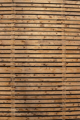 Brown wood texture background coming from natural tree. The wooden panel has a beautiful dark pattern, hardwood floor texture