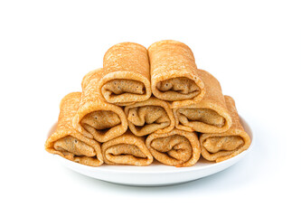 A stack of stuffed pancakes in a plate isolated on a white background. Pancake day.