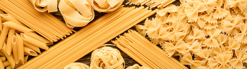 A varied assortment of pasta types top view banner