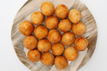 Typical Brazilian appetizer called Coxinha de Frango isolated on white background - Top view