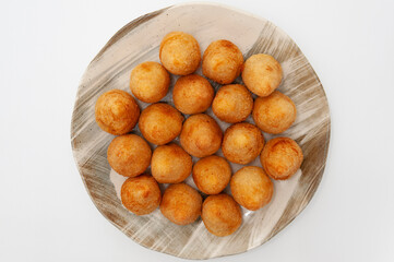 Typical Brazilian appetizer called Coxinha de Frango isolated on white background - Top view. Copy space