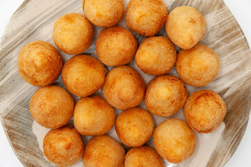 Typical Brazilian appetizer called Coxinha de Frango isolated on white background - Top view. Close-up