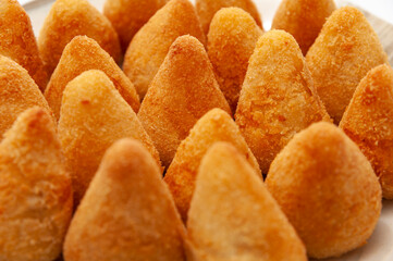 Typical Brazilian appetizer called Coxinha de Frango - Close-up