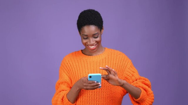 Short butch haired male woman use gadget post isolated violet color background