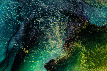texture with gold painting made in the technique of alcohol ink