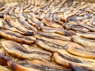 drying bananas traditionally with soft focus image.