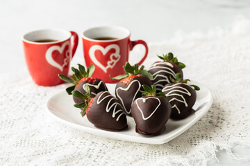 Decorated chocolate covered strawberries for sharing on Valentines Day.