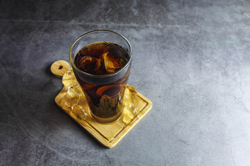 black soft drink in a glass