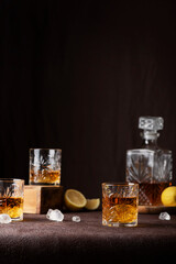 Glasses of rum with ice and lemon