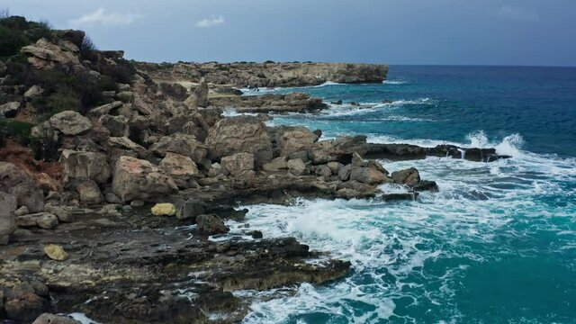 Sea ocean waves splash rocks background nature water blue