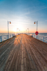 sunset on the pier in Jurata